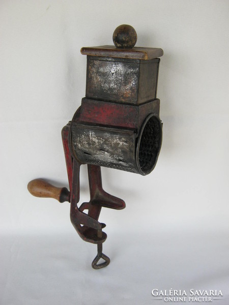 Old magician cast iron grinder nut grinder