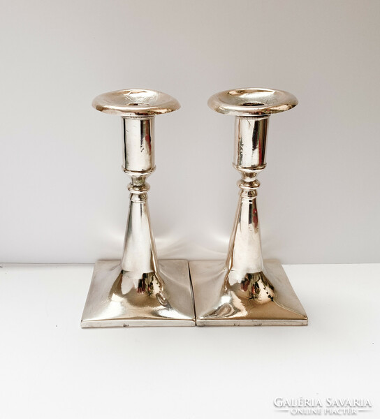 Pair of antique silver candle holders.