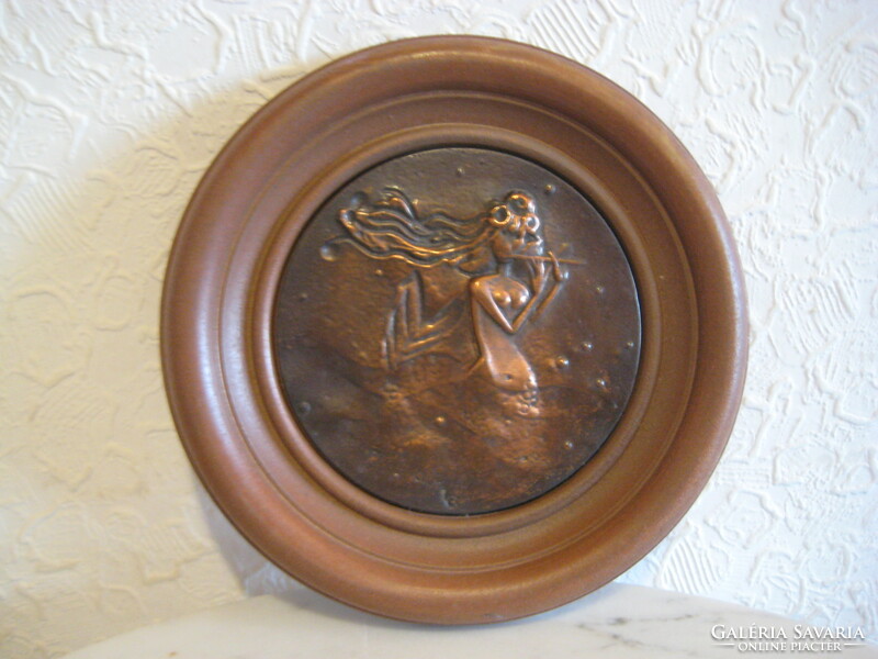 The seductive siren, bronze and terracotta frame is 14 cm and 9 cm in bronze