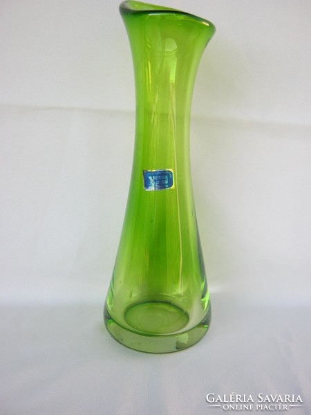 Hermann crystal in green glass vase