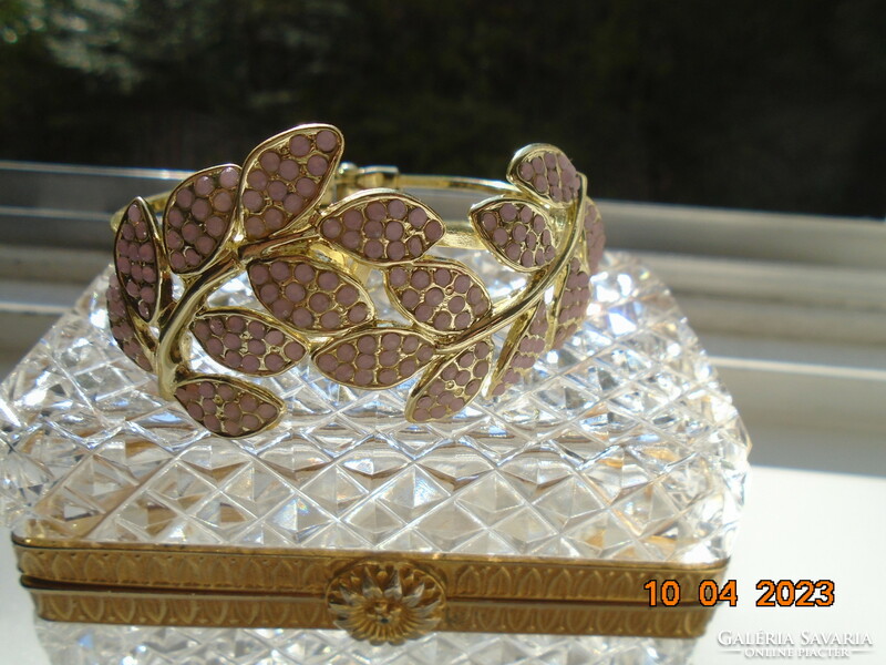 Gold-plated spring steel bracelet studded with small pink stones