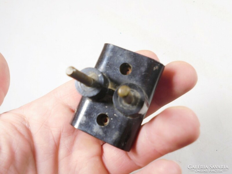 Retro socket distributor black electrical accessory with 3 prongs from the 1970s