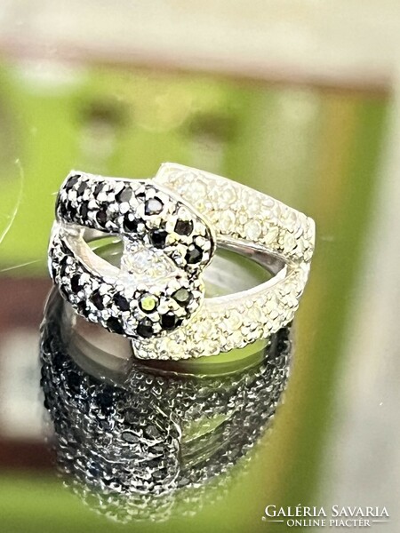 Dazzling silver ring, embellished with black and white zirconia stones