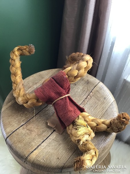 An old monkey figure woven with kay fur can be hung