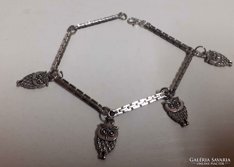 Thick stainless steel rectangular necklace adorned with owl pendants