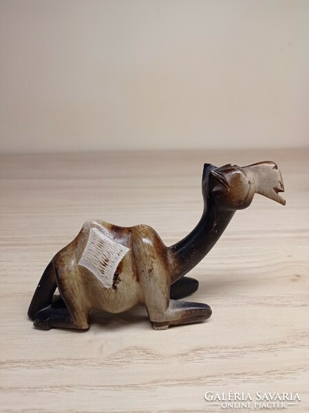 Carved camel statue