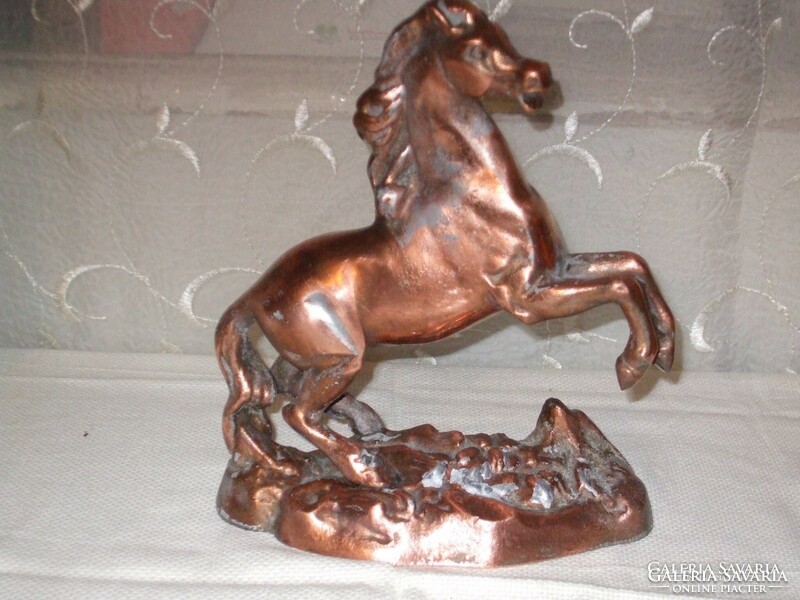 Antique bronzed horse.
