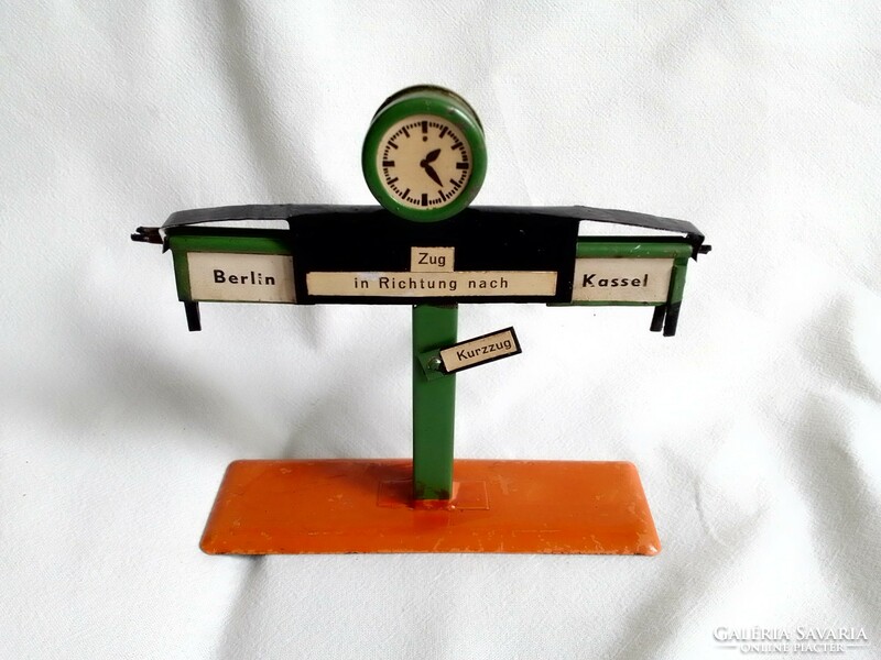Antique old railway station direction indicator stand with clock, model 0 railway train, field table accessory