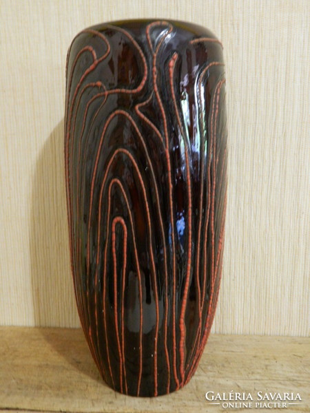 A large plague cold well vase