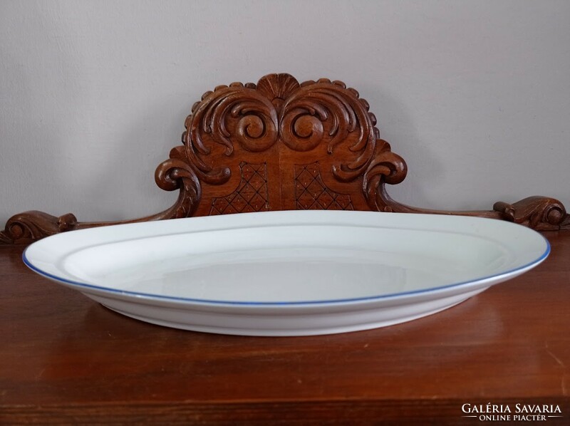 Old lowland porcelain oval porcelain bowl with meat and roast