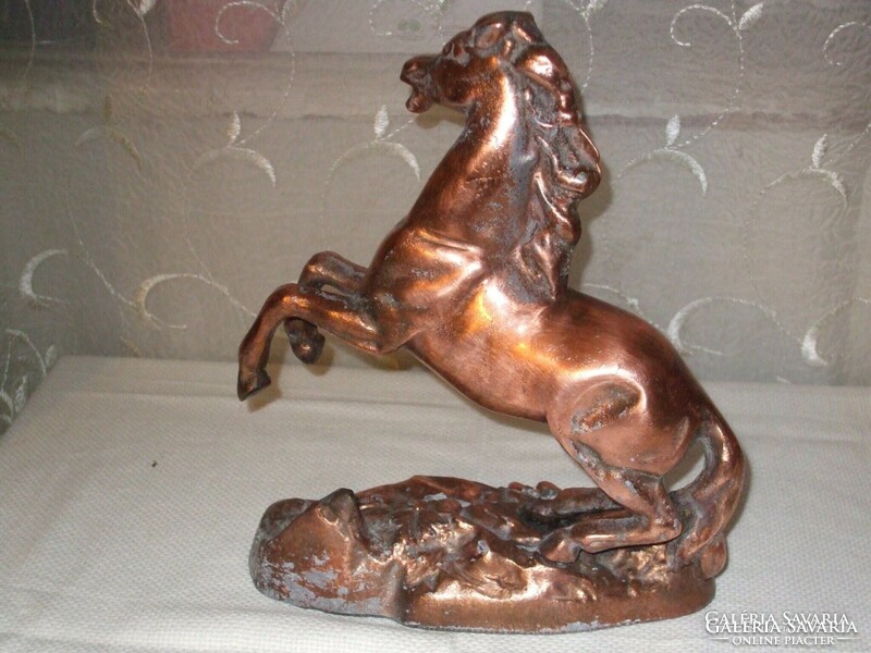 Antique bronzed horse.