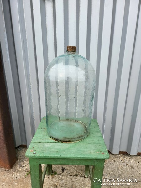 Large colored glass bottle