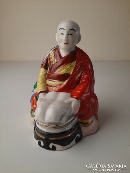 Antique porcelain statue, oriental figure