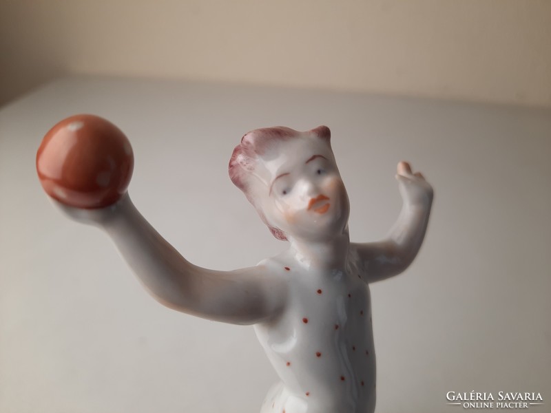 Retro porcelain statue, figure of a little girl playing a ball