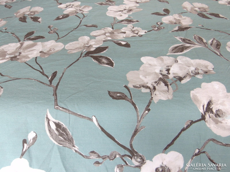 Beautiful cotton bed linen with white flowers on an olive green background