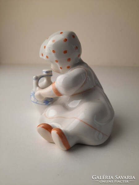 Zsolnay porcelain statue, seated girl figure with a jug
