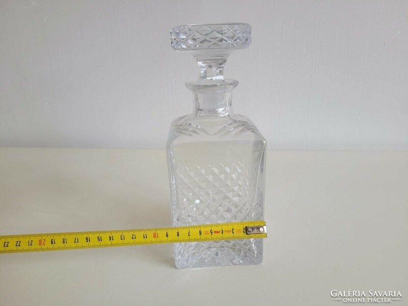 Old drinking glass square crystal whiskey corked bottle