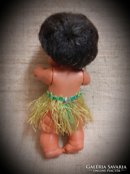 Old sleeping rubber doll in good condition with braided combable hair