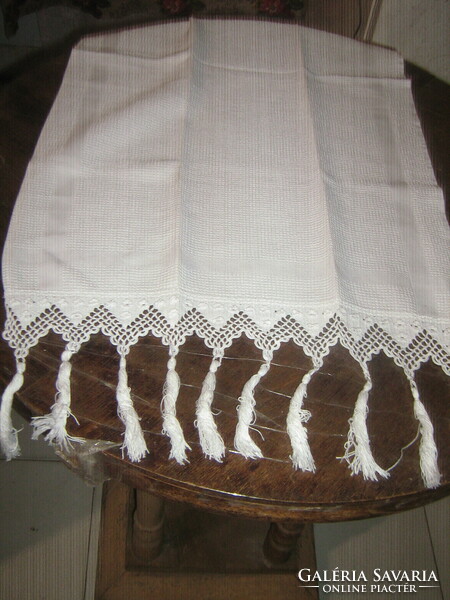 Beautiful snow-white vintage-style crocheted fringed napkin table cloth