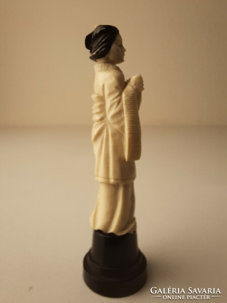 Miniature vinyl geisha statue