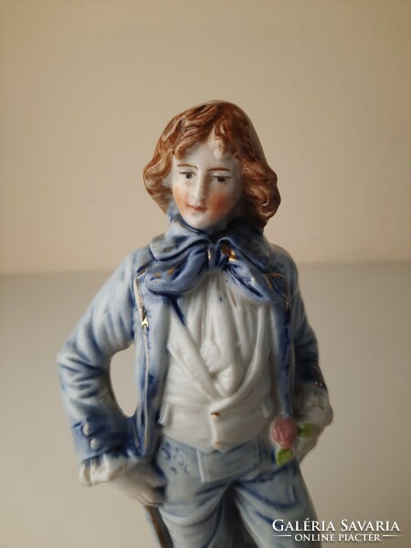 Antique ceramic statue, young male figure