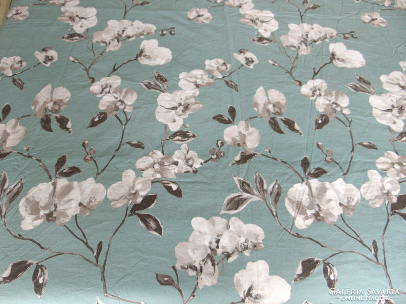 Beautiful cotton bed linen with white flowers on an olive green background