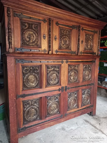 Antique unique figurally decorated renaissance style cabinet