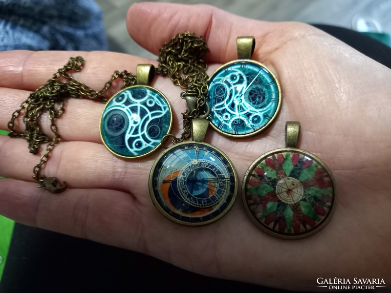 Bronze and silver-plated pendants, compasses, amulets with steampunk glass lenses