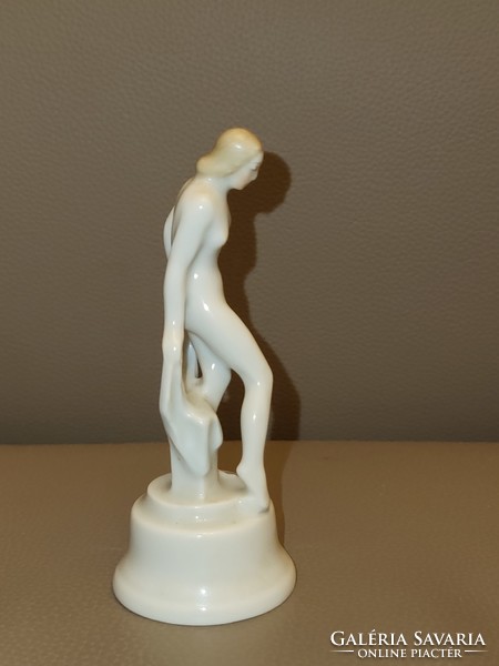 Nude woman from Herend after bathing