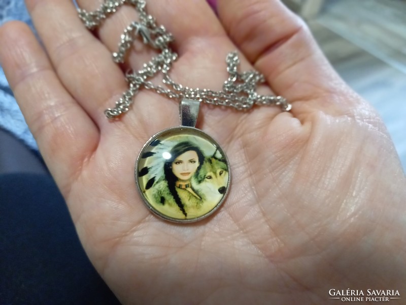 Bronze and silver-plated pendants, amulets with glass lenses