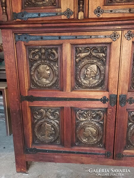 Antique unique figurally decorated renaissance style cabinet