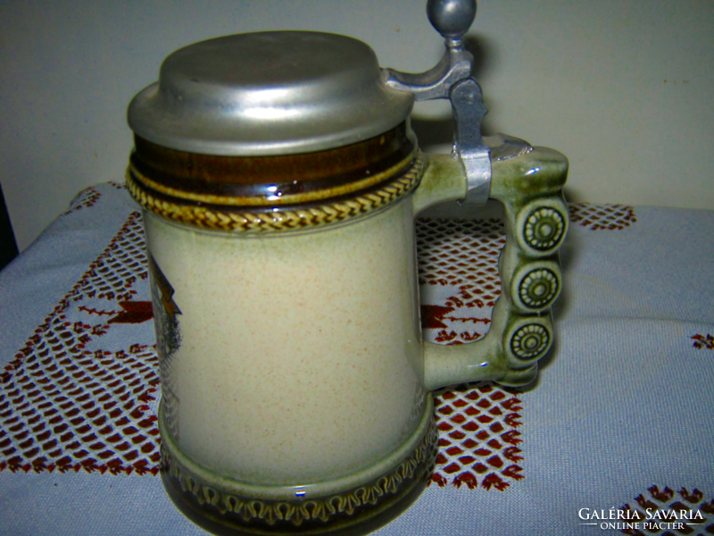 Beer jug with a tin-covered mug