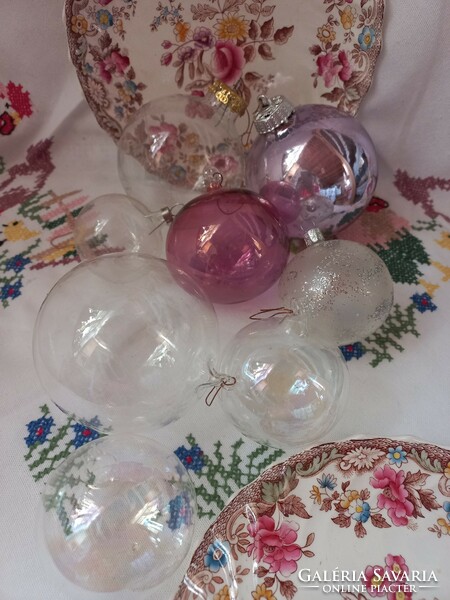 Transparent glass and plastic Christmas tree decorations in one