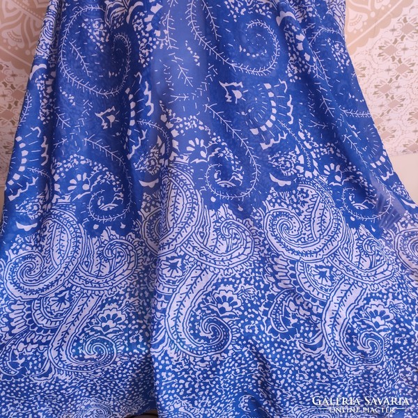 Fluffy light beach towel with a blue pattern