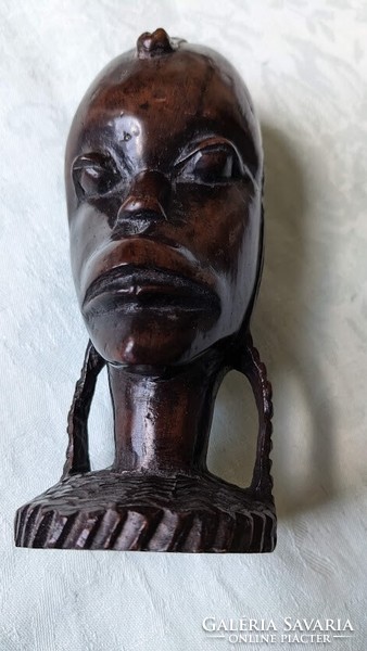 Female head African wood sculpture