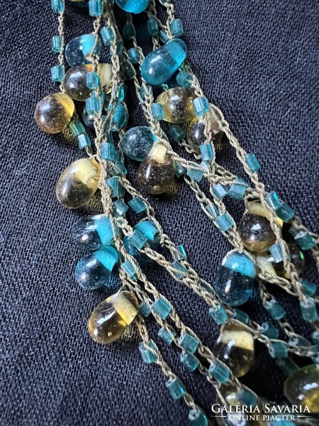 Necklace with blue and brown pearls strung in several rows, bijou