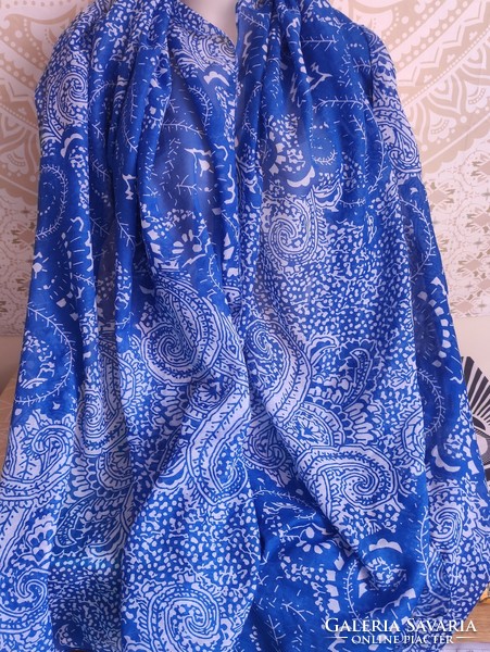 Fluffy light beach towel with a blue pattern