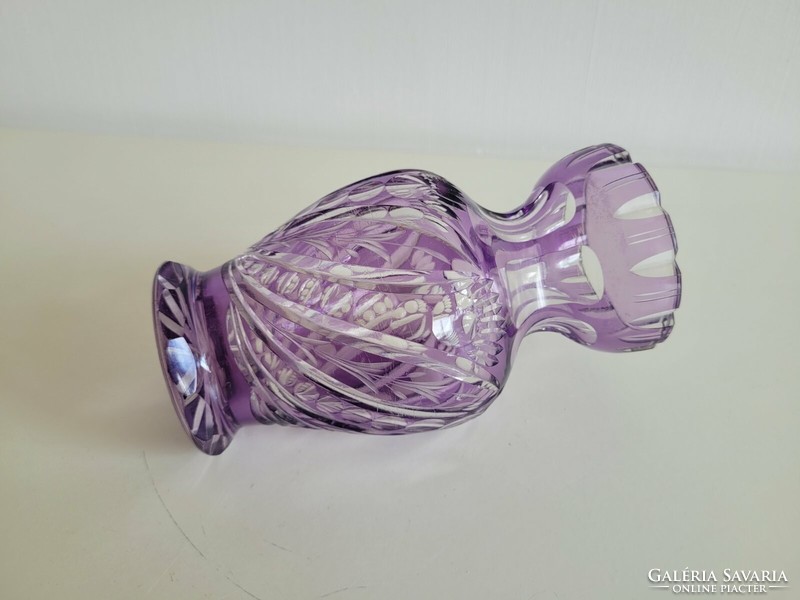 Purple polished decorative vase of an old crystal vase
