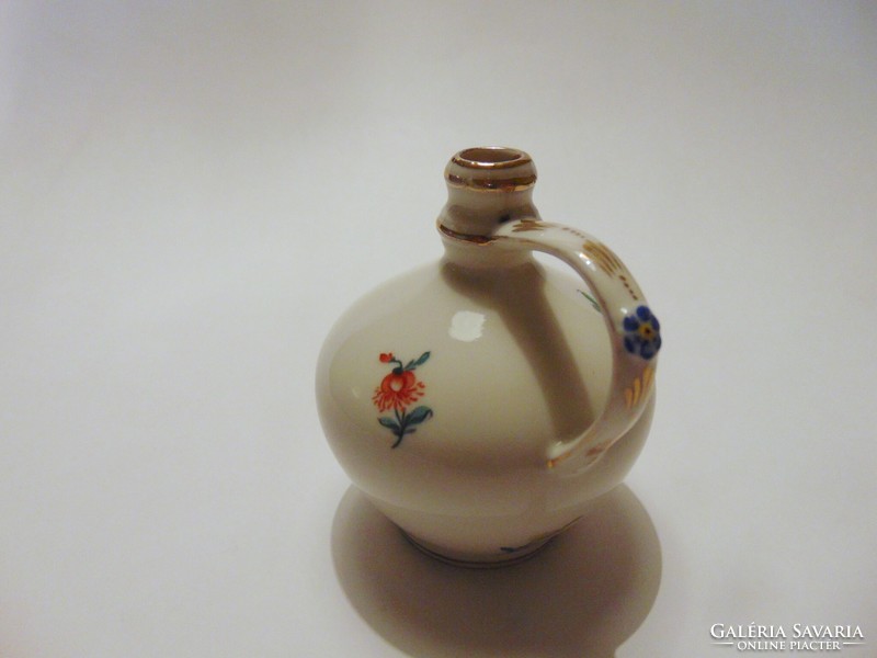 A small jug with an Old Herendian handle