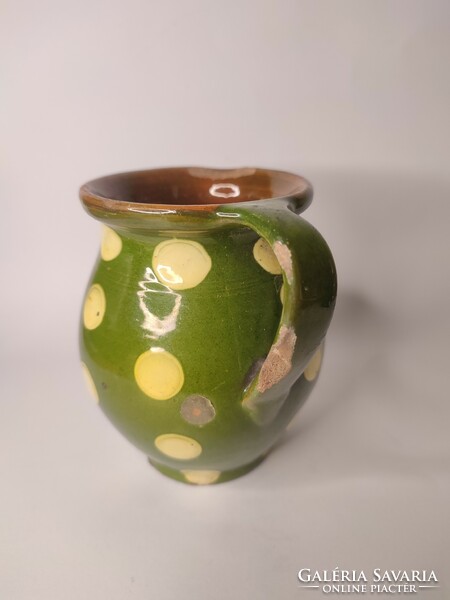 Old small polka dot folk earthenware pot