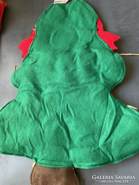 Advent calendar with Santa Claus in green tones with felt bags