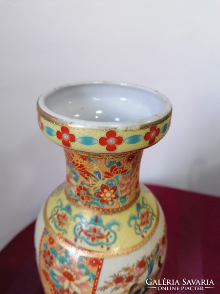 Chinese patterned peacock motif vase