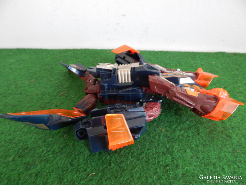 The Transformers toy shown in the picture is in excellent condition, 30 cm long,