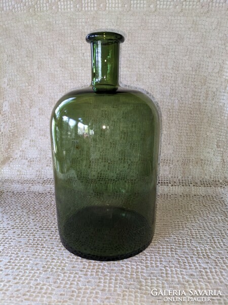 Green apothecary bottle