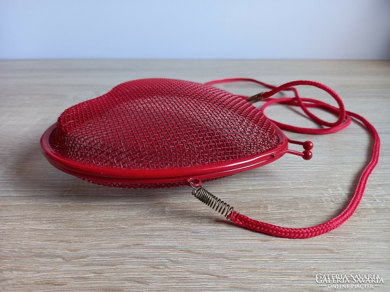 Retro heart shaped red metal bag