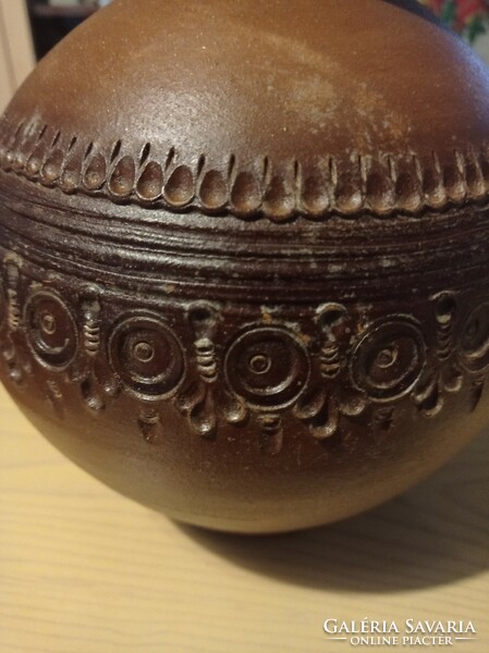 Ball-sized ceramic vase with a big belly