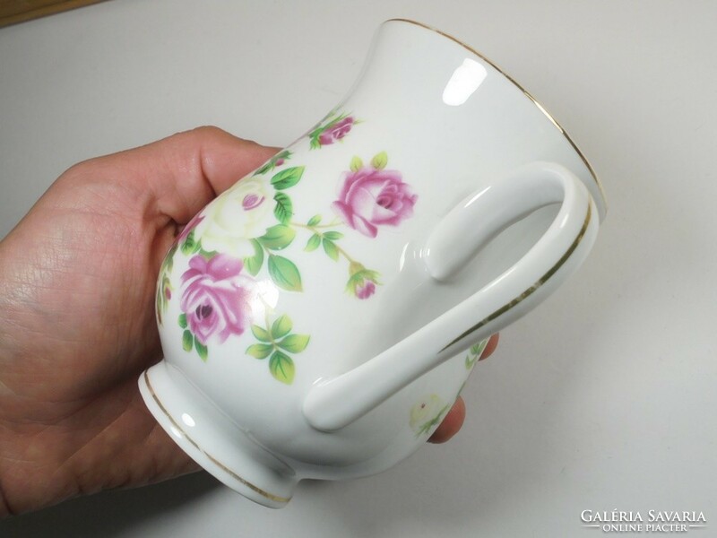 Retro old porcelain mug flower, rose pattern