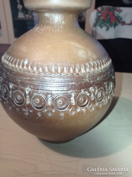 Ball-sized ceramic vase with a big belly