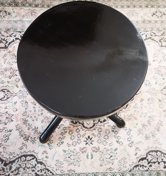 Antique black piano chair marked thonet in good condition.