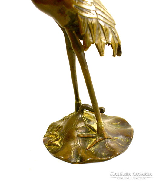 Antique crane figural candle holder